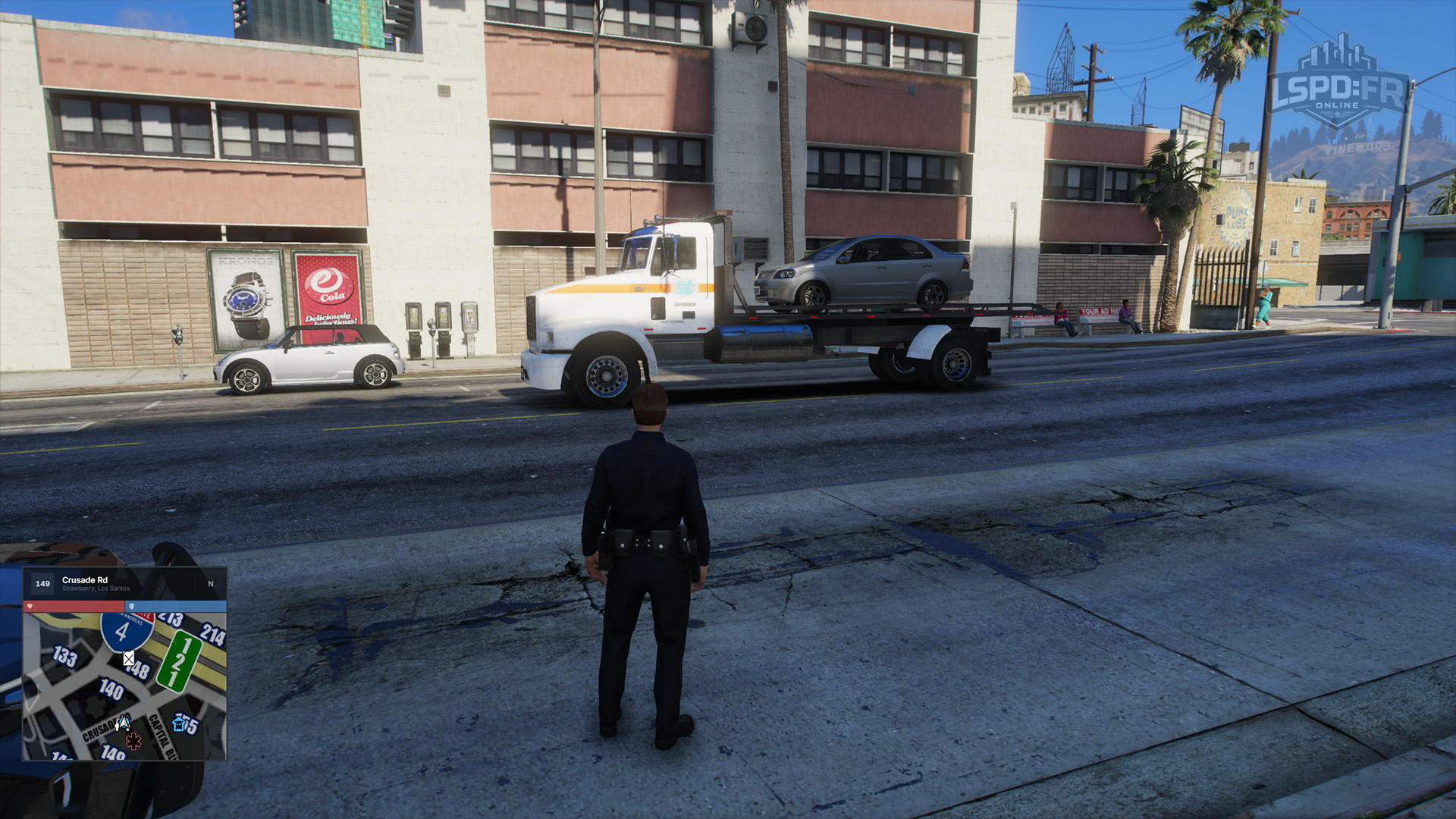 A vehicle loaded onto the tow truck's flatbed